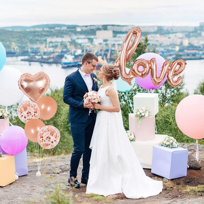 Balon din Folie Metalizata, ANGELBEAR, Model Love scris de mana, 102x65 cm, Tematica Ziua ÃŽndrÄƒgostiÈ›ilor, Ambalaj Individual, Pai Inclus, Umflare cu Aer sau Heliu, Rose Gold